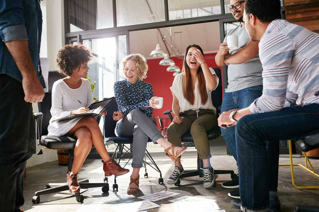 diverse team has a collaborative meeting
