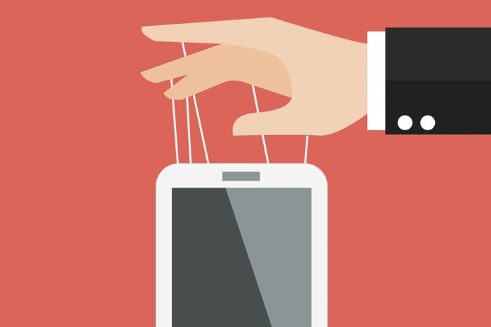 hand controlling smartphone like puppet