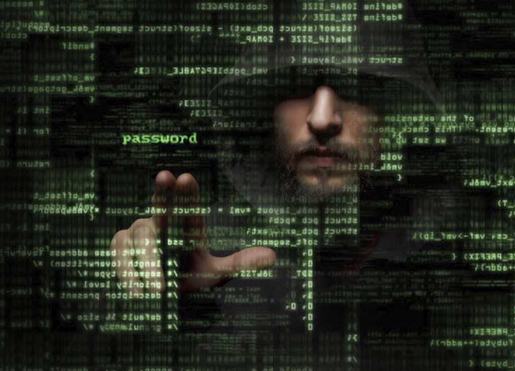 Hacker manipulating code