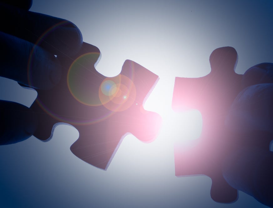 together puzzle pieces sun