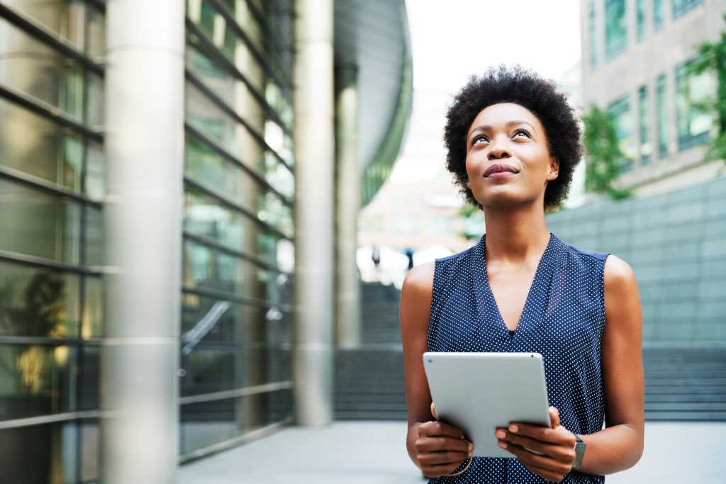 Woman Holding laptop