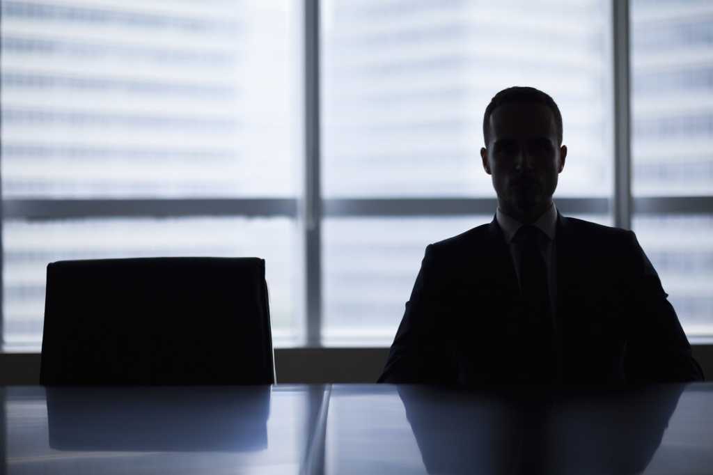 boardroom job opening executive in silhouette empty chair new job