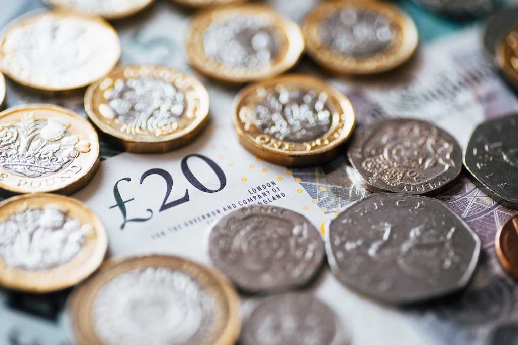 British pound banknotes + coins / currency / money