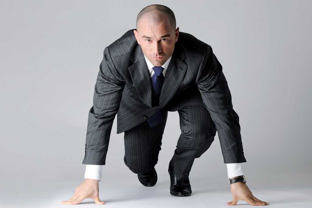 businessman at starting line race speed compete