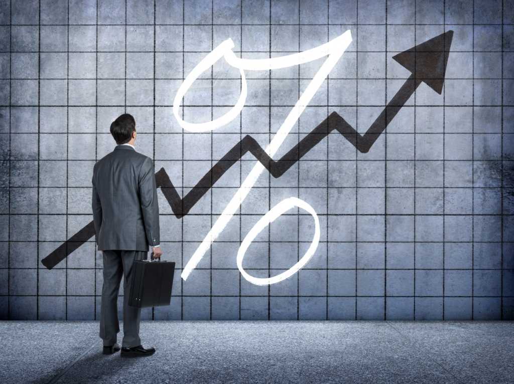 businessman looking at prospect of higher interest rates 000069618279 medium