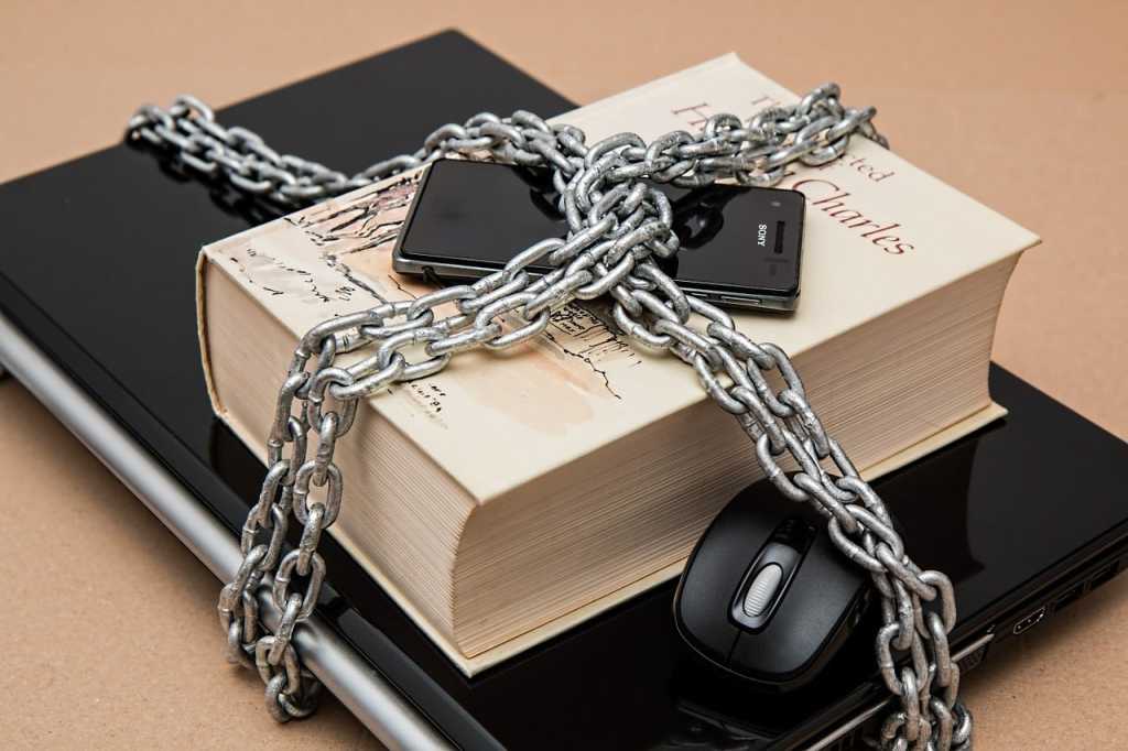 censorship laptop smartphone book