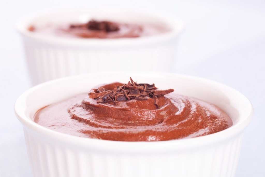 chocolate mousse in white ramekin with grated chocolate picture id1148626448