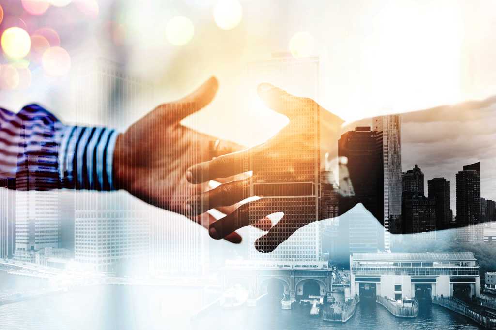 handshake / teamwork / collaboration / partnership / deal / negotiation