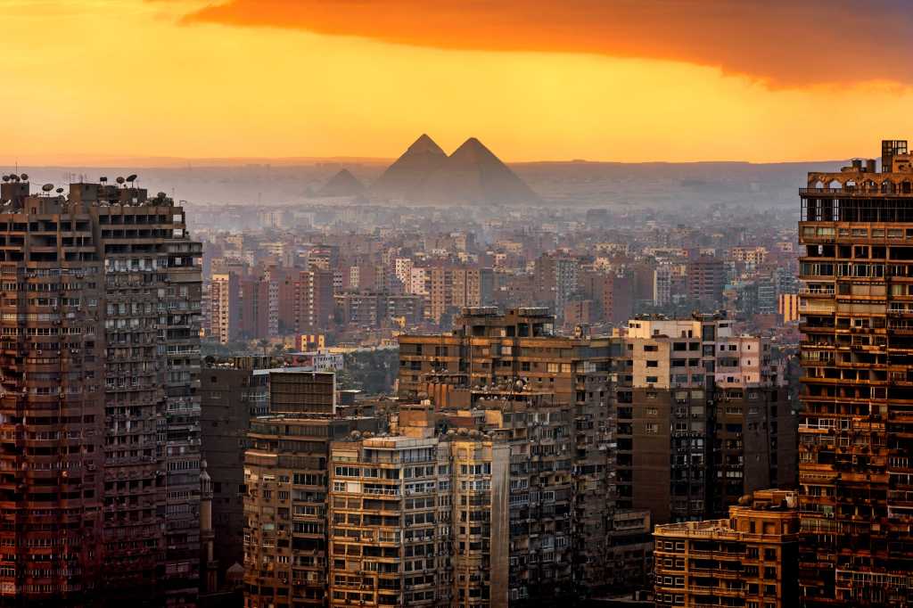 CIO | Middle East > Egypt > Cairo skyline + Giza pyramids