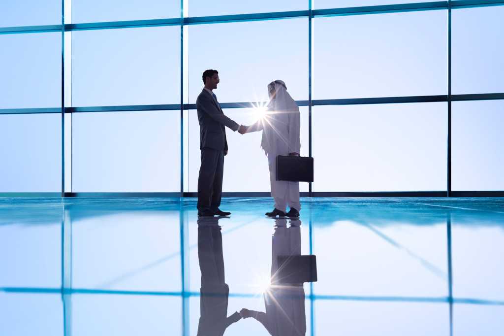 CIO | Middle East > Handshake / agreement / deal / teamwork / collaboration / partnership