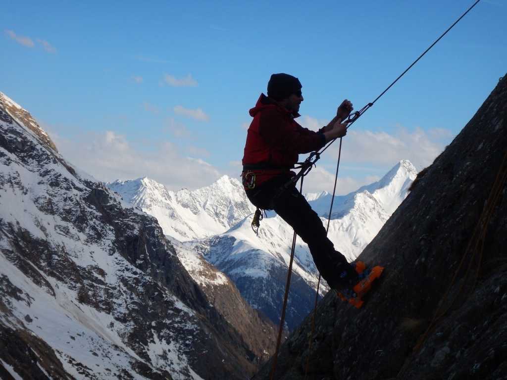 climb mountain scale peaks climber