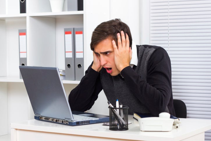 confused user worker laptop computer