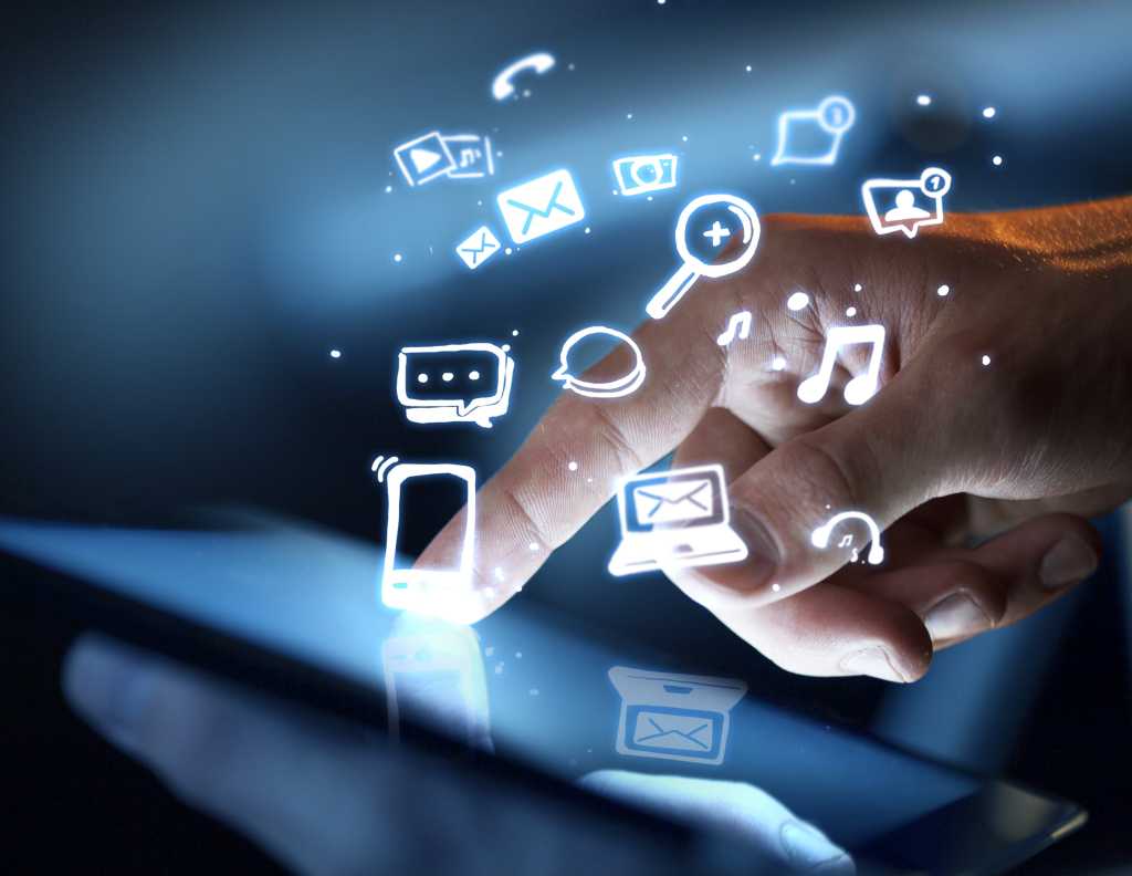 consumer tech hand holding tablet
