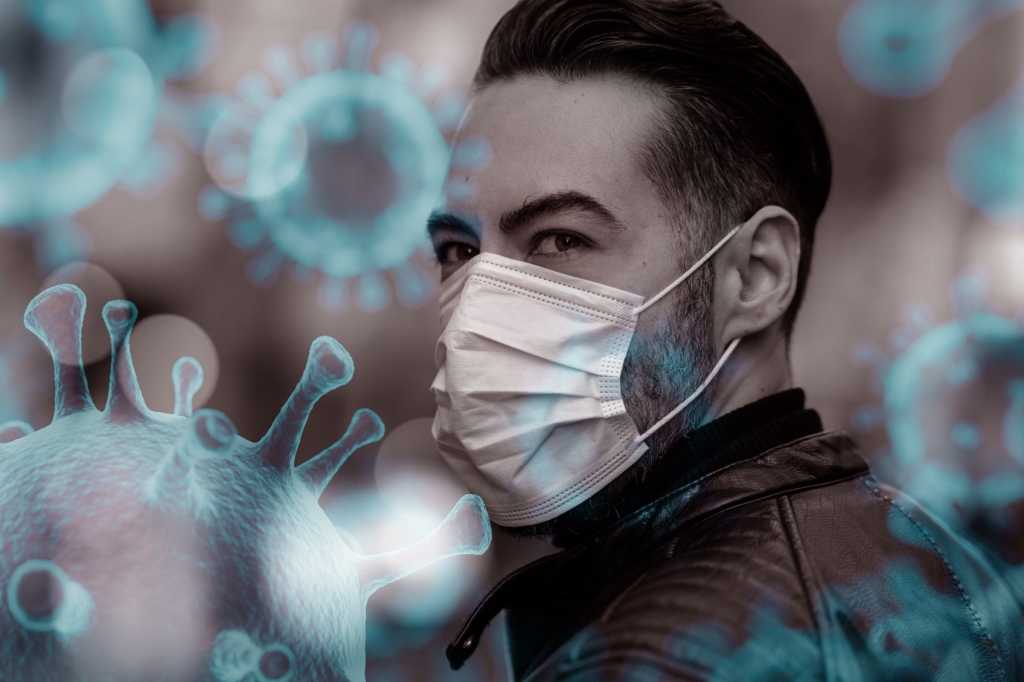 covid 19 coronavirus battling virus with surgical mask by recep bg getty images 1210129671 virus ce