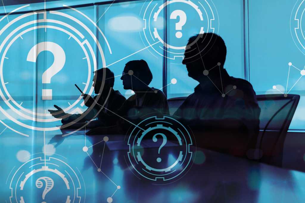 A group of business leaders / board members with questions.