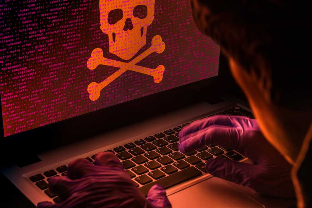 Cybersecurity > Skull + crossbones / abstract code / criminal hacker / attack / security threat