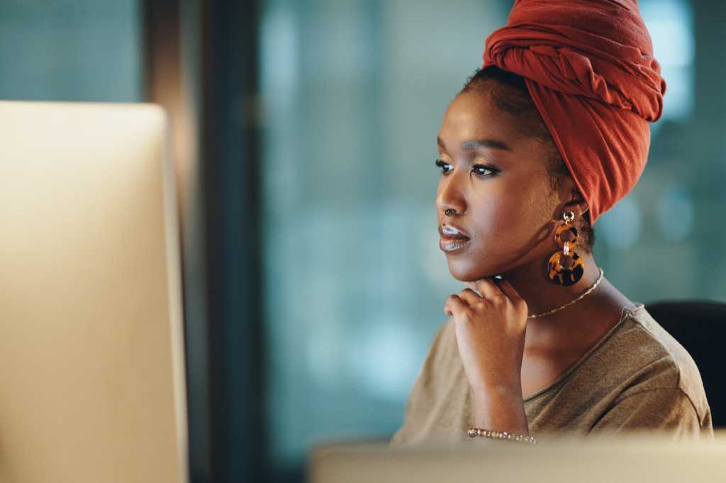 diversity gender equality south africa south african woman at computer in office africa by delmaine
