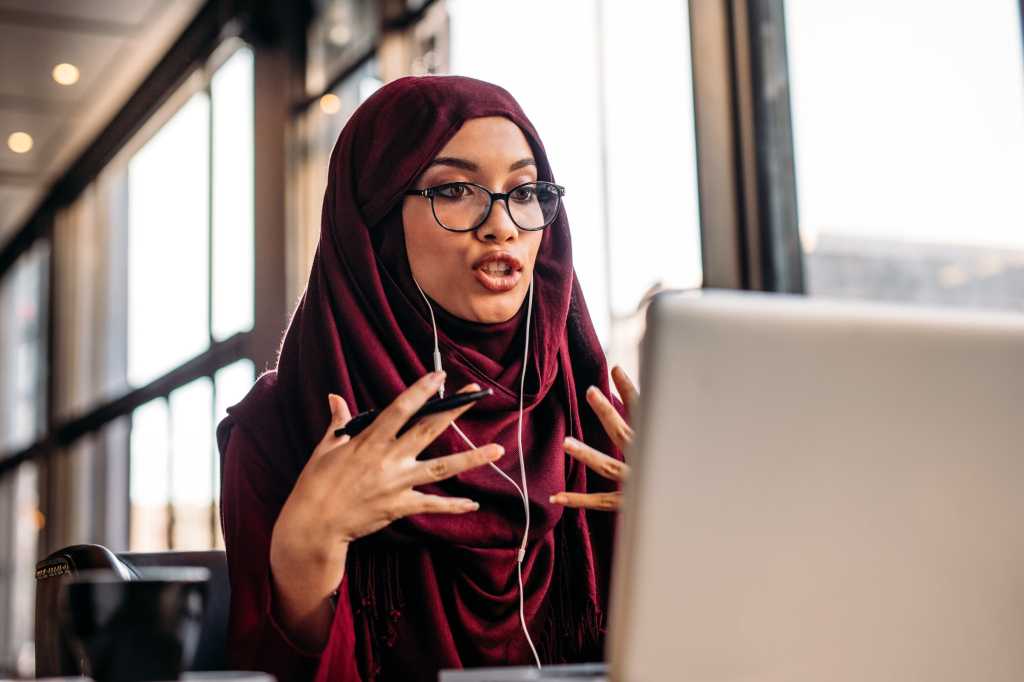diversity south african woman in hijab on video chat middle east uae by jacoblund gettyimages 10974
