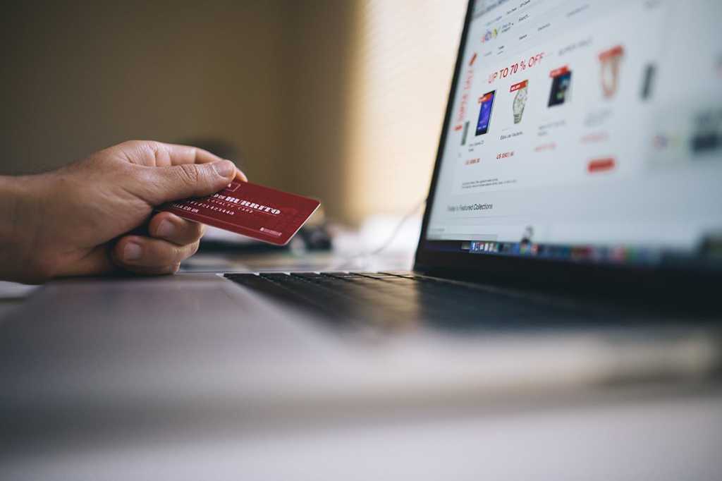 online shopping ecommerce transaction via laptop