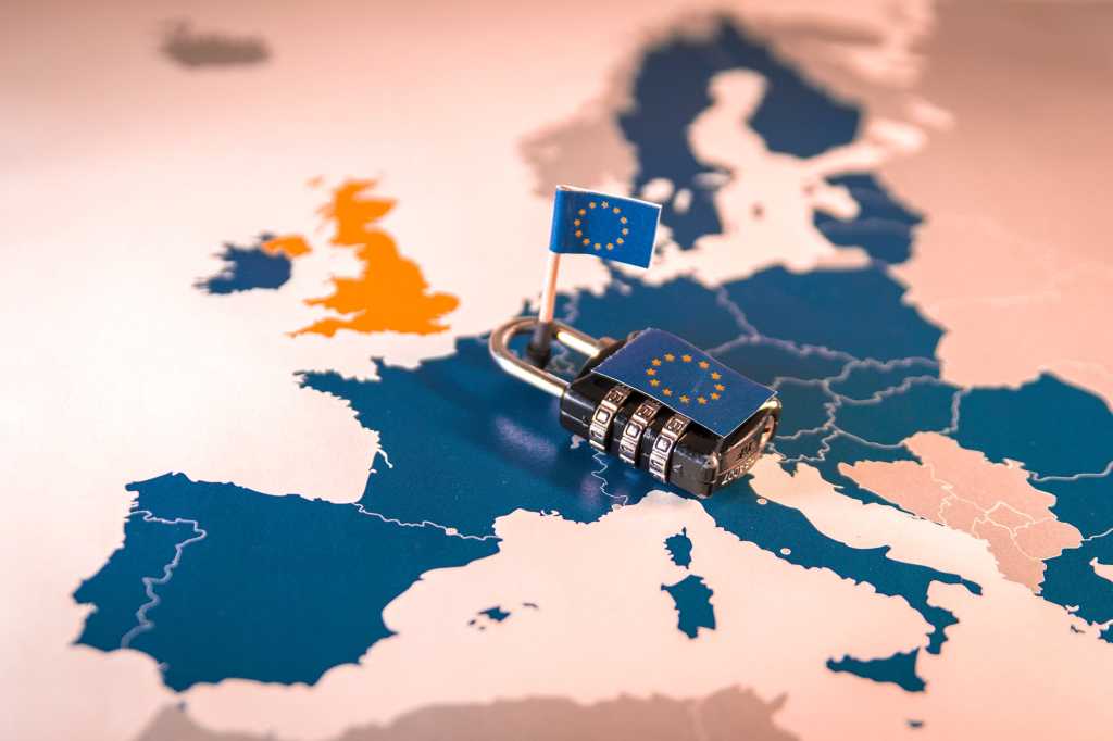 Map of Europe with the flag of the European Union and a combination lock / GDPR / security / privacy