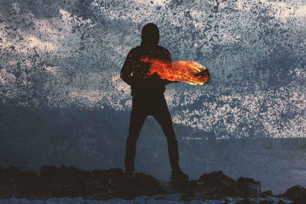 fighting fire with fire man with lit torch change agent