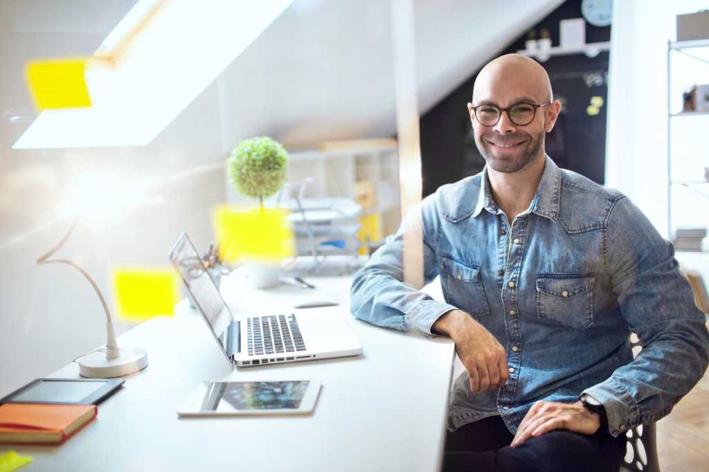 young hipster executive in modern office