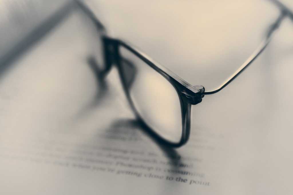glasses on book study certification skills programmer school by james sutton unsplash
