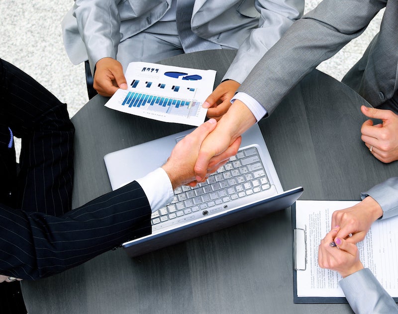 hands shaking at end of meeting