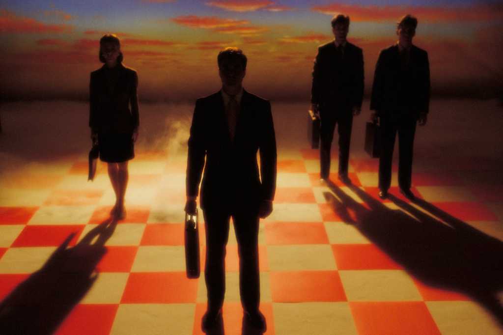 human chessboard chess strategy business briefcase