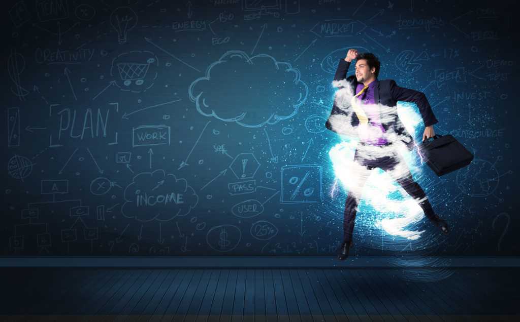 Happy business man jumping with storm cloud around him stock photo