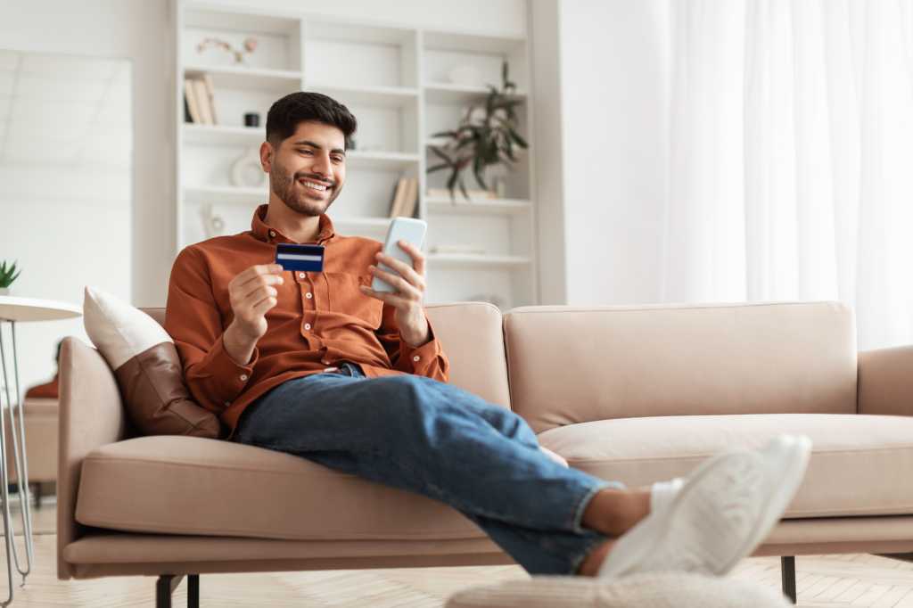Man purchasing through mobile phone
