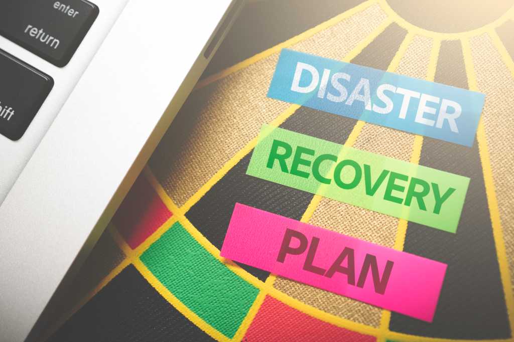 Disaster Recovery Plan stock photo with bullseye and laptop