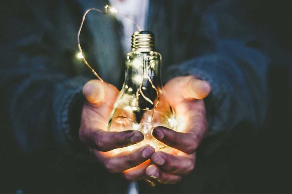 lightbulb / light string hands / ideas / brainstorming / invention / innovation