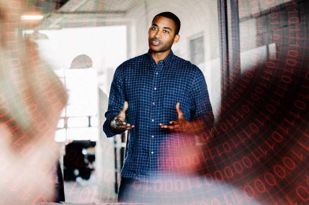 man pitching idea confident leader speaking talking presenting soft skills