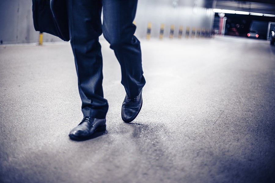 man walking garage