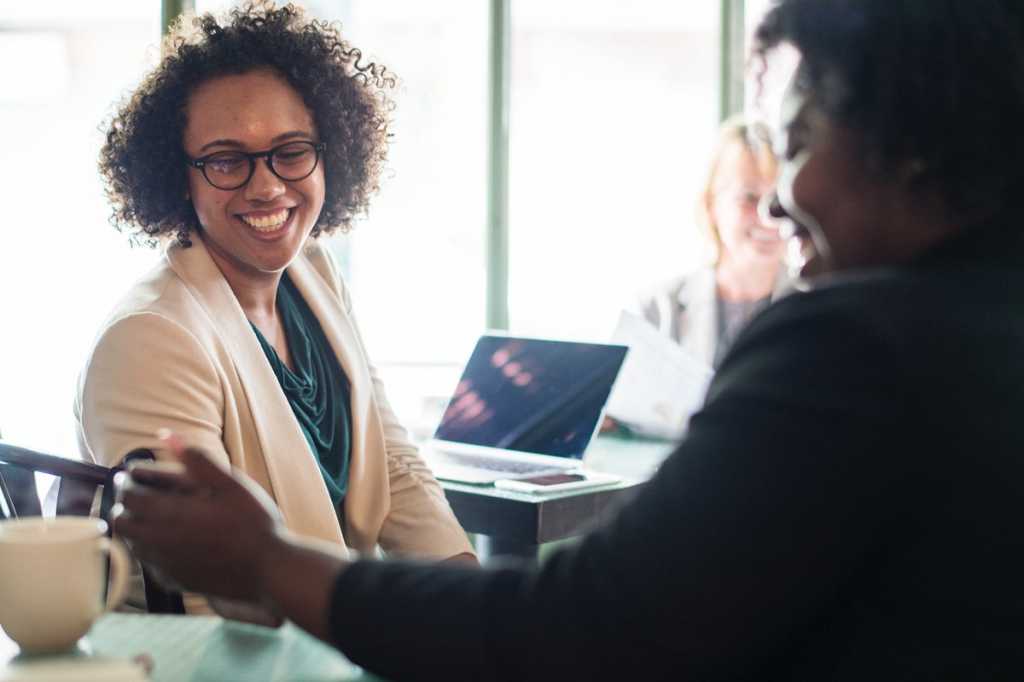 mentor teach learn student team partner women smiling by rawpixel via unsplash