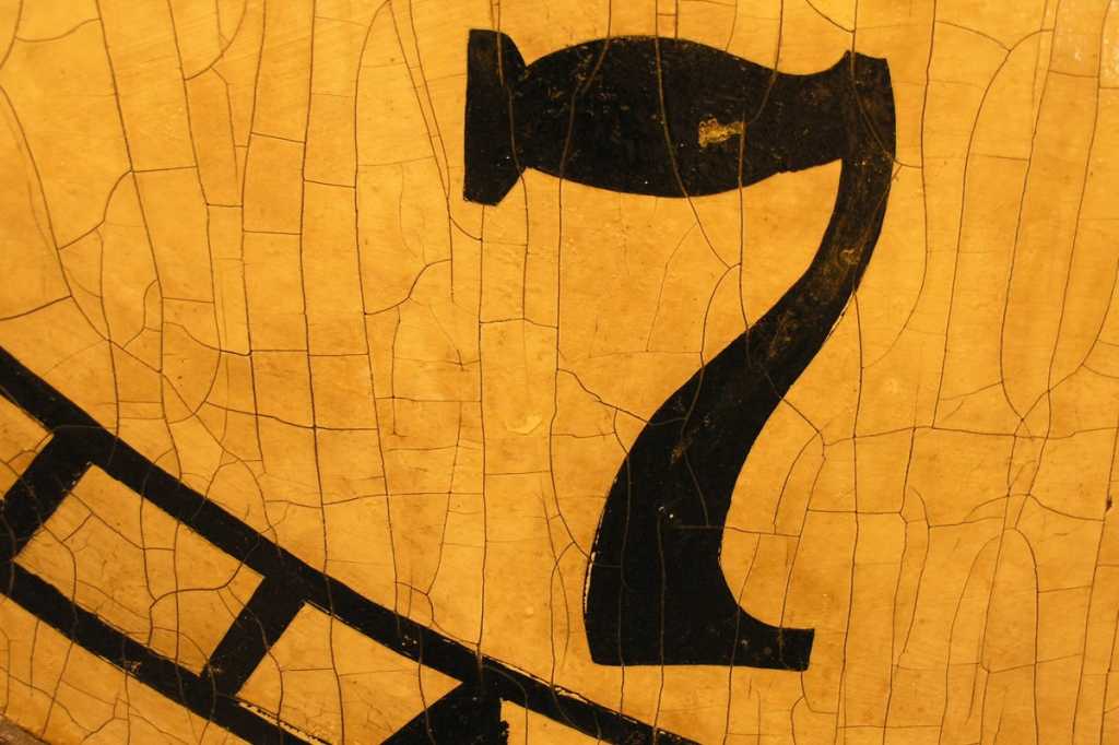 number 7 on wood top seven