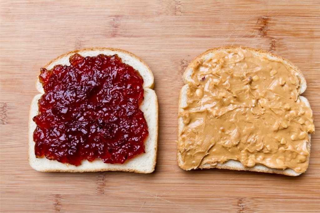open face peanut butter and jelly sandwich picture id168447993