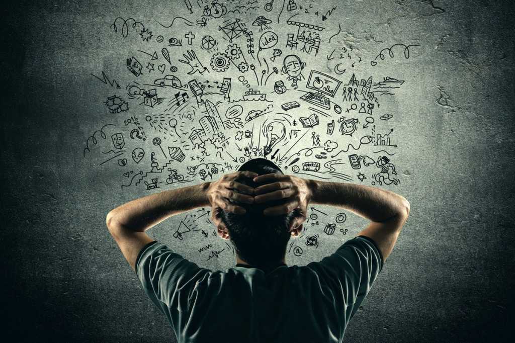 overwhelmed man stressed analytics information overload