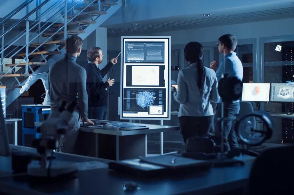 project manager does motivational presentation or team of electronics picture id1217882744