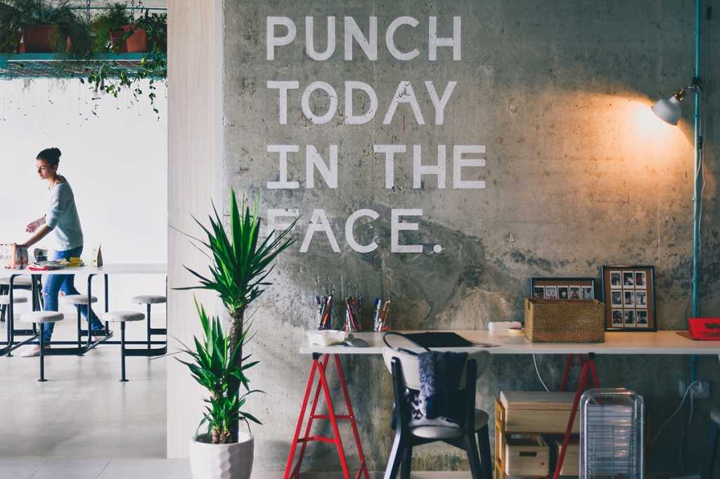 Sign in a co-working workspace: Punch today in the face