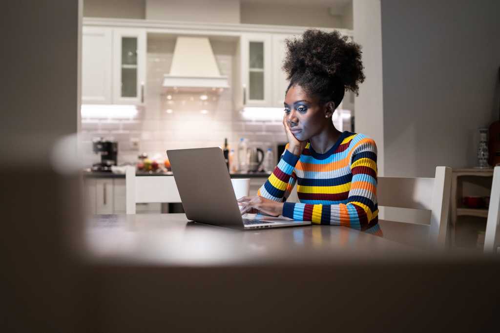 Remote worker > A woman works from home