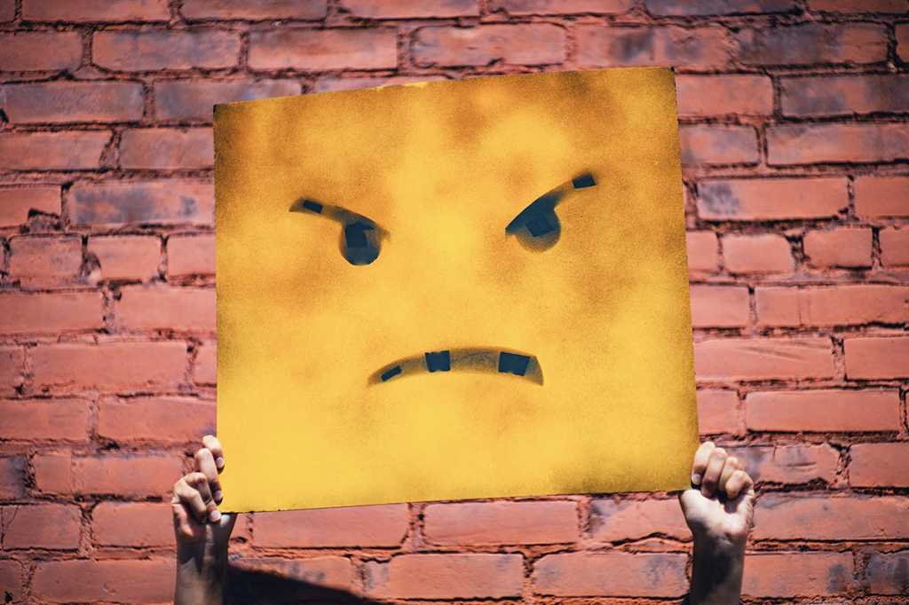 sad angry unhappy frustrated hands holding sign andre hunter 350301 unsplash
