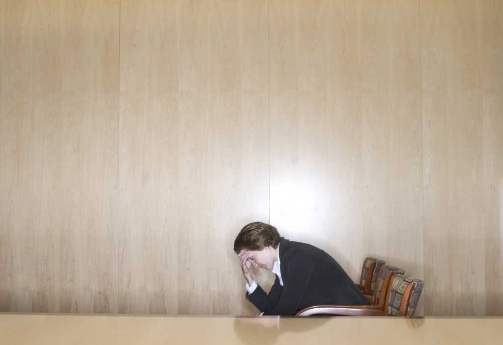 stressed businessman businesswoman worried depressed overworked down thinking