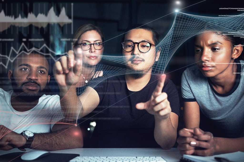 team manipulates coding elements / programming / interface / development / developers / teamwork