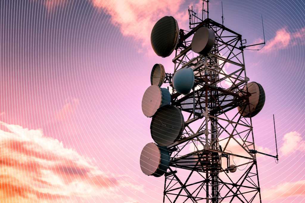 Wireless telecommunications tower emanating concentric waves of transmission.