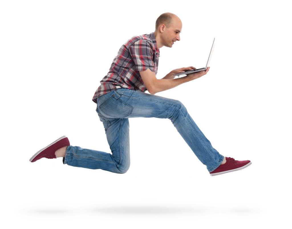 hipster running with laptop