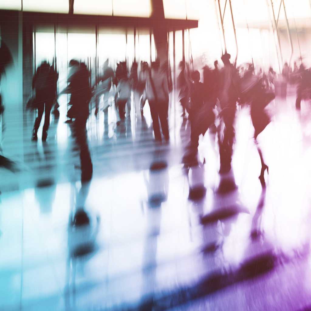 Blurred group of people in convention center or lobby