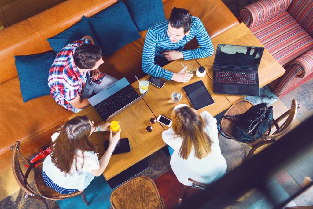 Millennials working in casual space collaborating