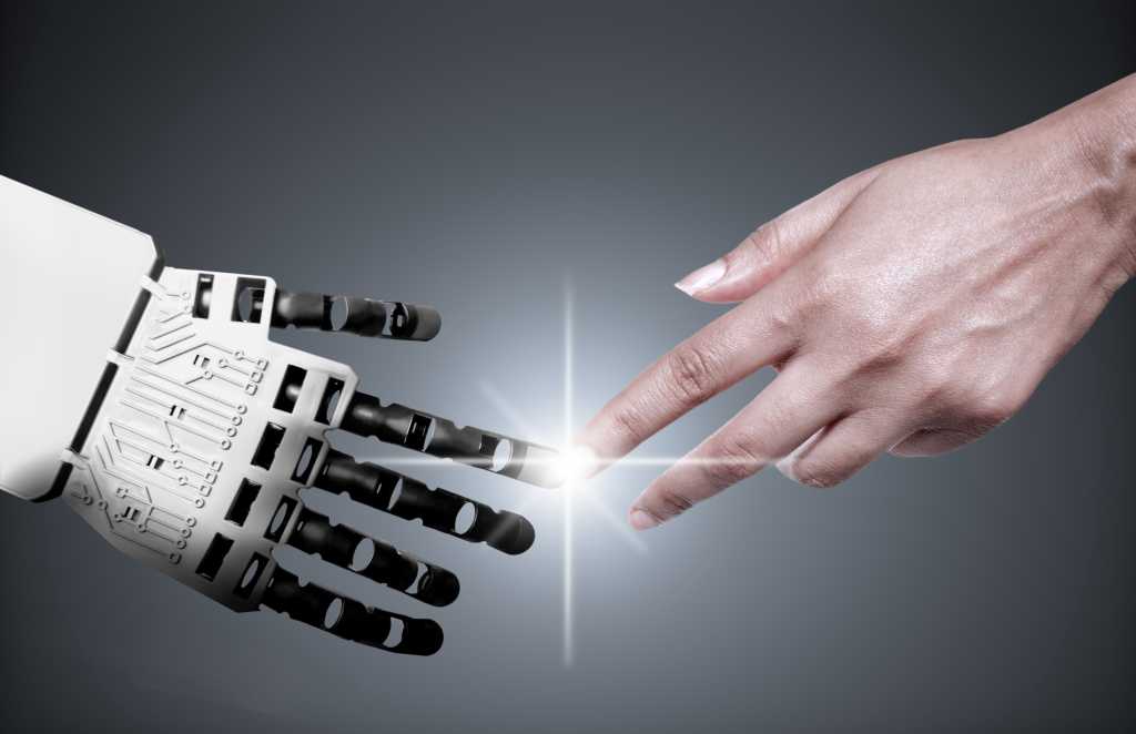 robot reaching out to human hand